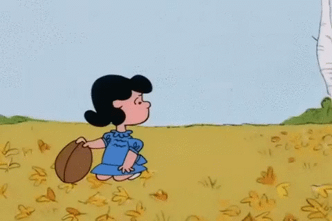 Lucy yanking the football away from charlie brown